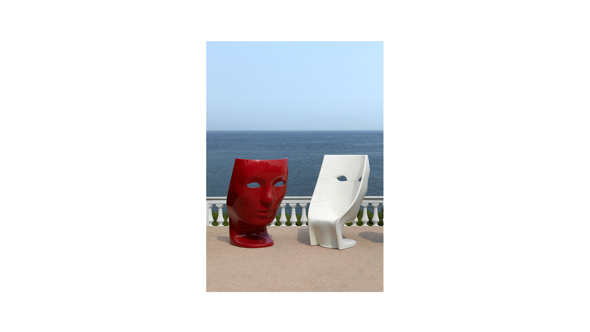 Fabio Novembre Nemo chairs for Driade, red and white versions by the sea